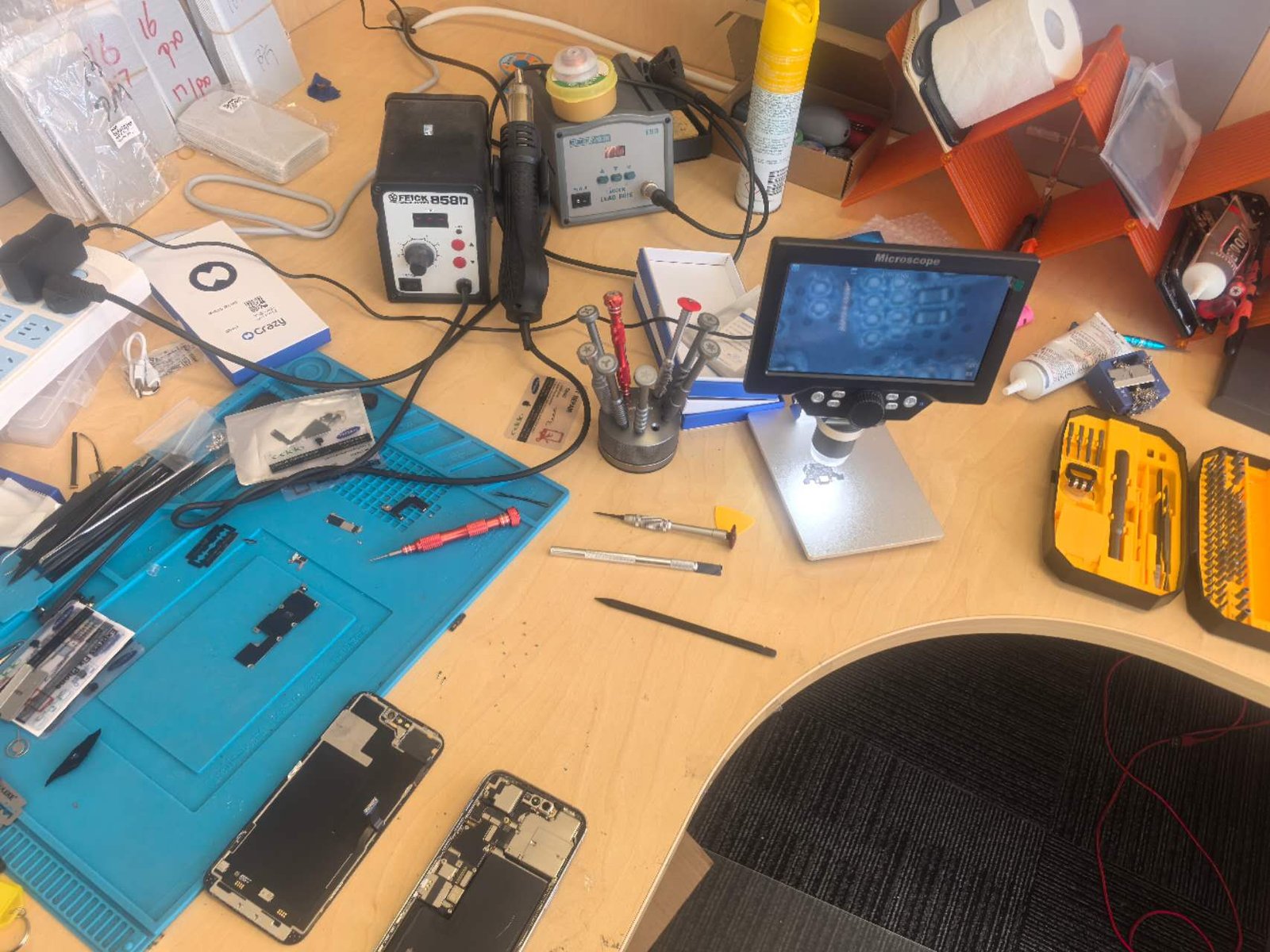 A phone being repaired on the bench at Expressfixphone Berwick